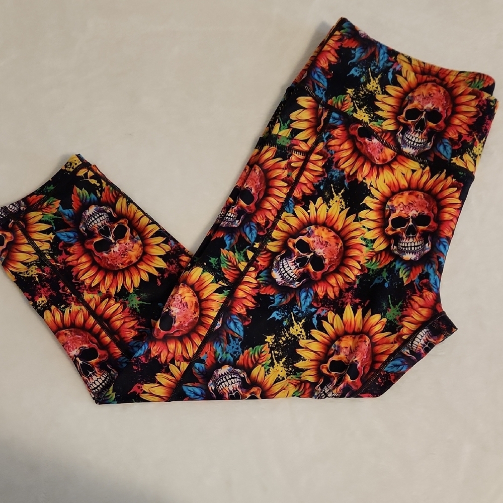 Constantly Varied Gear Black and Yellow Capri Leggings Vibrant Floral Design